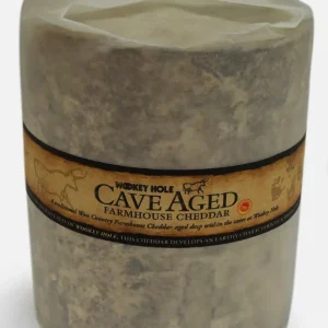 Cheddar Cave Aged 18 meses Ford Farm cuña de cheddar inglés curado con pasta firme y color dorado
